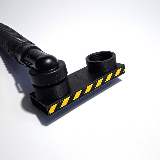 UKINK AlphaTec Vakuum-Adapter in schwarzer Produktansicht mit gelben Markierungen